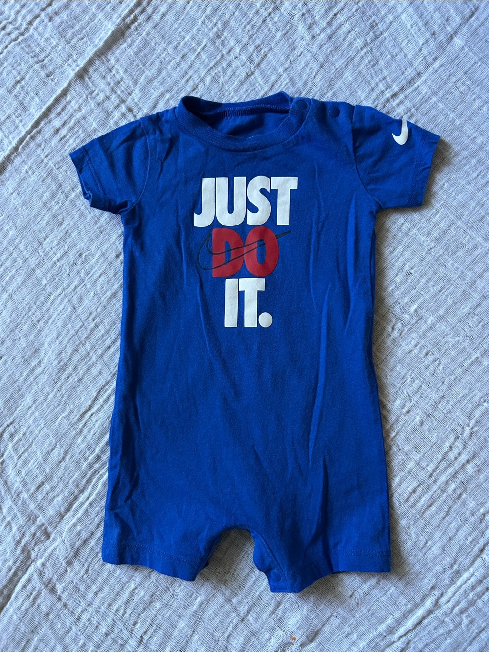 Nike Kids Blue 'Just Do It.' Bodysuit with Red and White Logo
